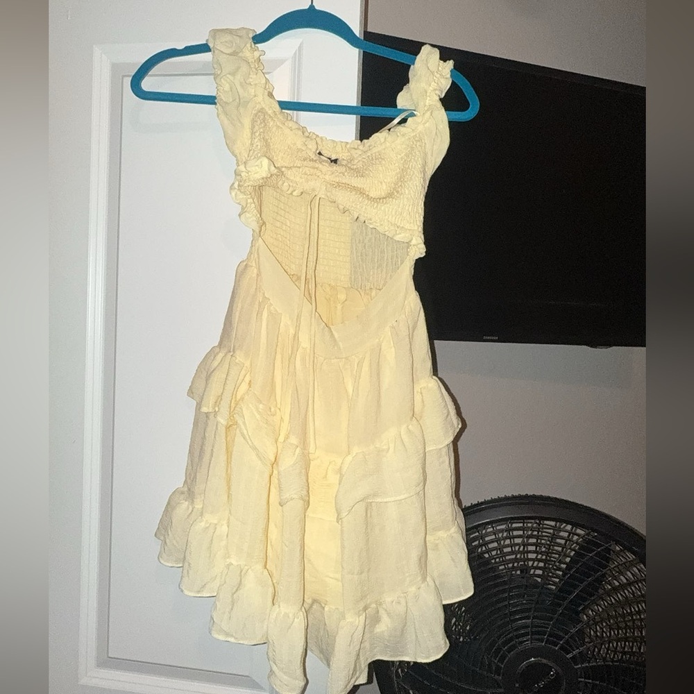 Mini yellow dress with cut out
